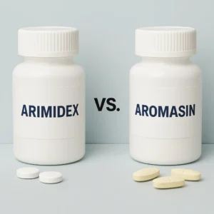 Labeled bottles of Arimidex and Aromasin with tablets in front.